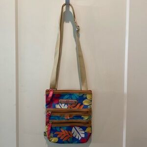 Lily Bloom Crossbody Purse with Multiple Zippers on Front.  Flower Design.‎